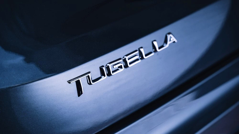 geely tugella шильдик 