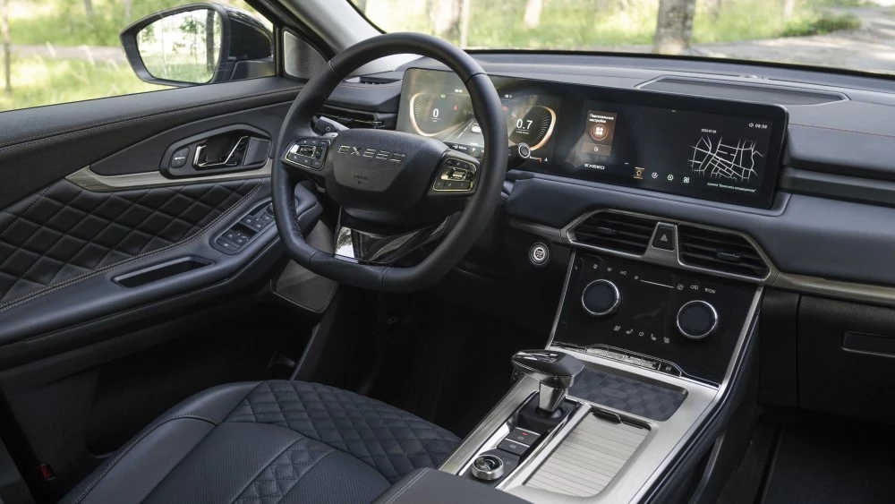 салон Exeed TXL 2.0 Sport Edition