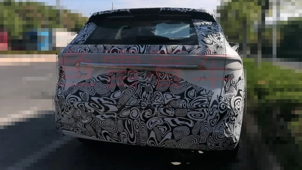 Chery Tiggo 9 сзади