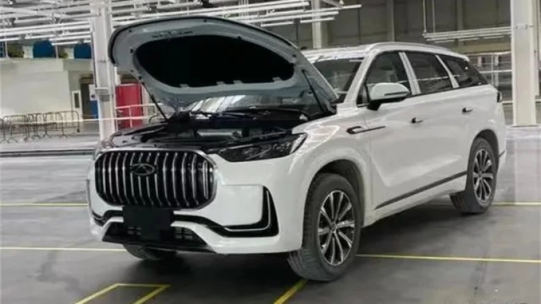 Chery выпустила первые кроссоверы Tiggo 9. Фото с конвейера кроссовер Chery Tiggo 9 спереди сбоку производство завод