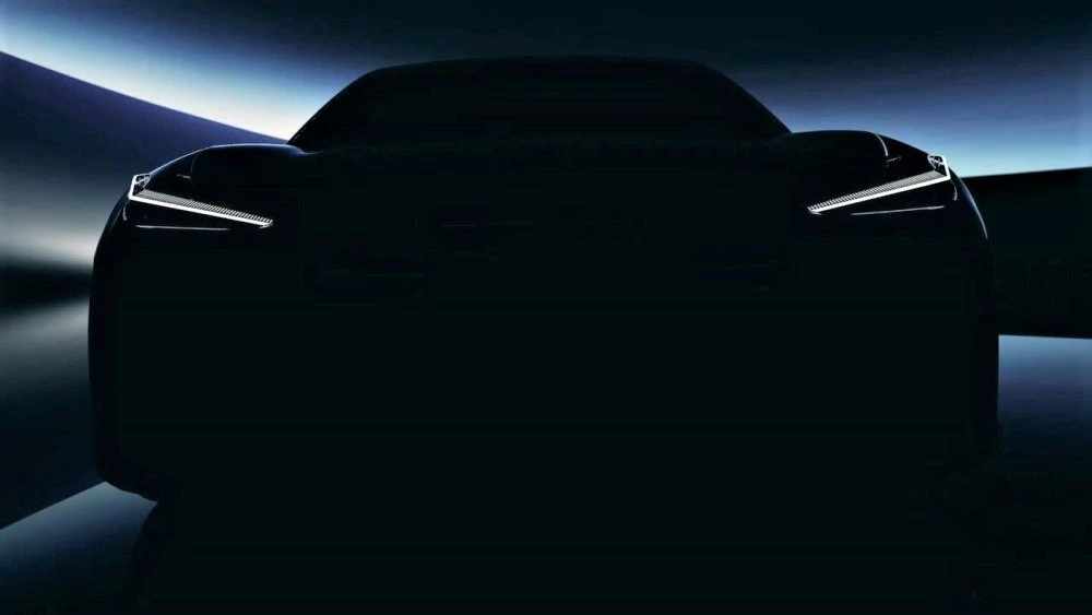 новый электрический седан Geely тизер спереди