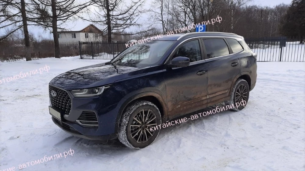 Chery Tiggo 8 Pro e+ в России спереди сбоку