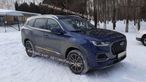 Chery Tiggo 8 Pro e+ в России спереди сбоку