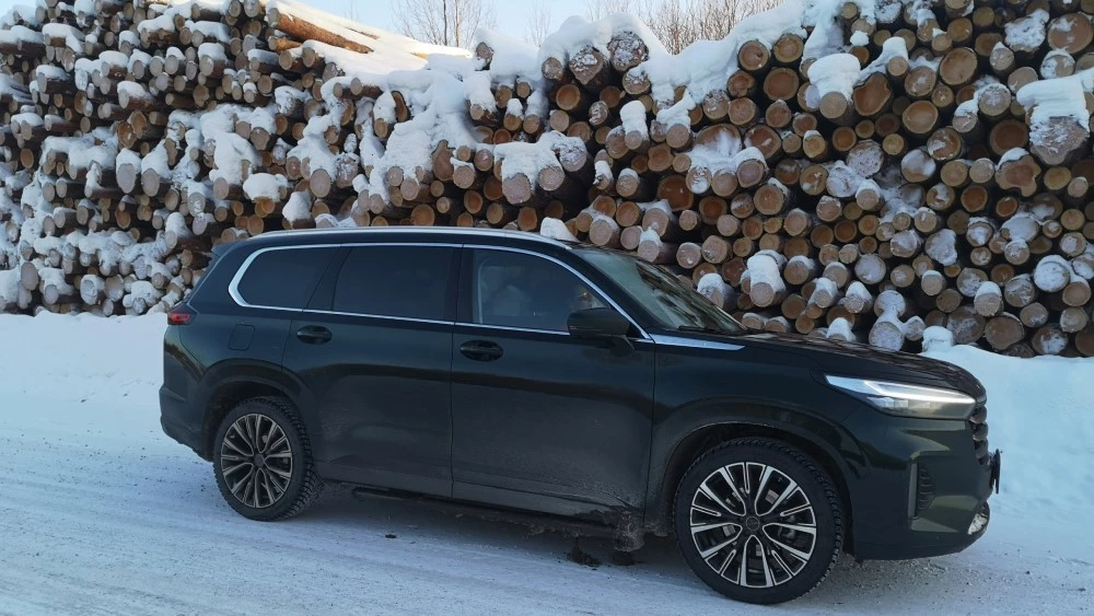 Exeed VX Limited Edition снег полный привод сбоку