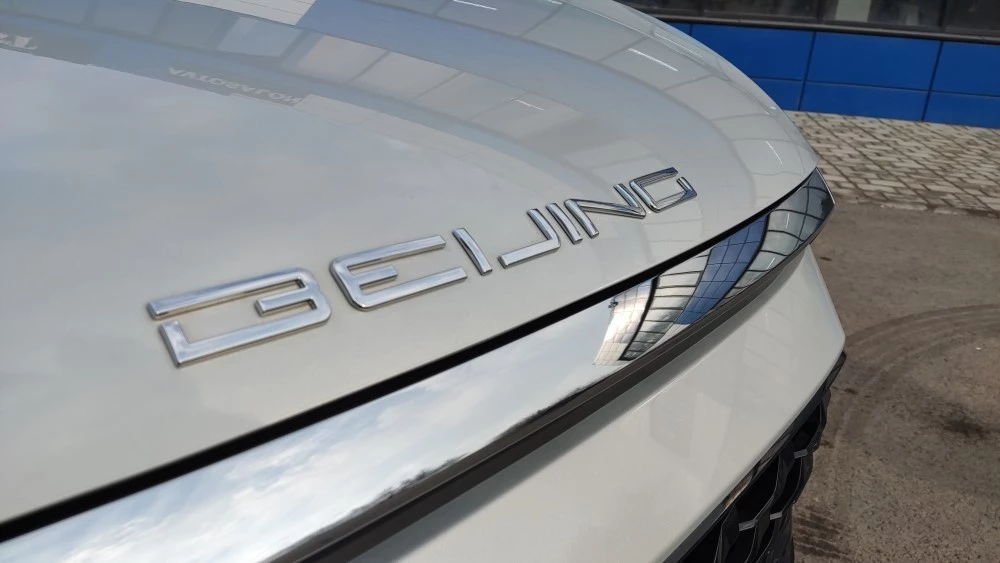 С чем в Россию приходит концерн BAIC. Изучаем его флагманский кроссовер Beijing X7 BAIC X7 логотип Beijing