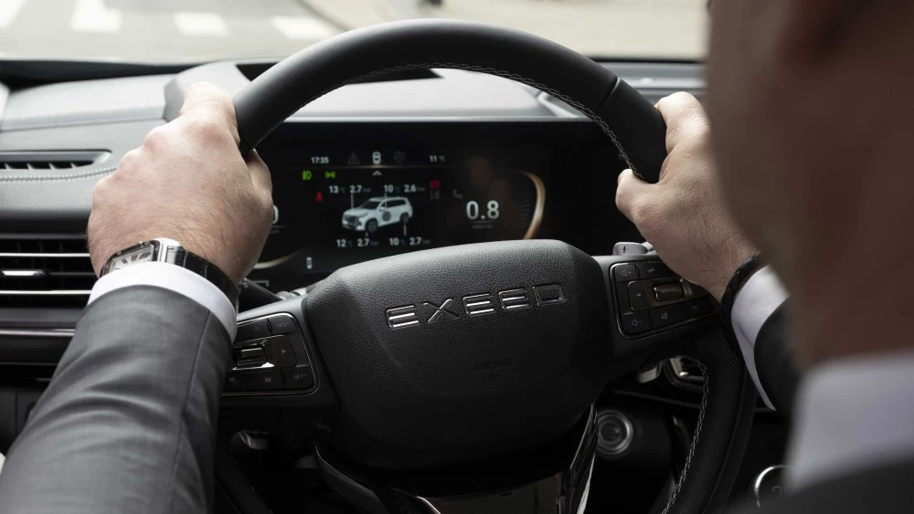exeed vx салон интерьер за рулем водитель