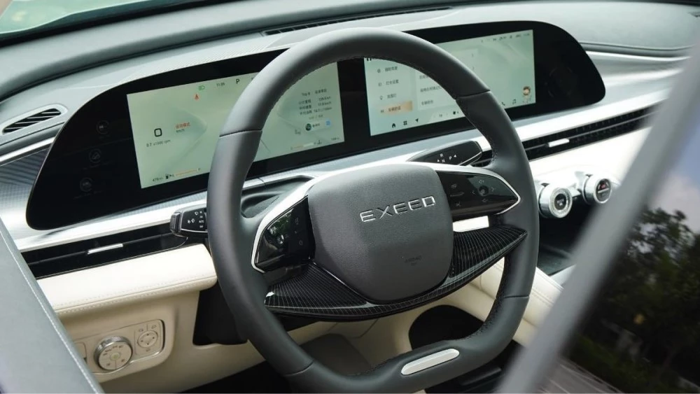 обновленный Exeed TXL 2024 салон интерьер