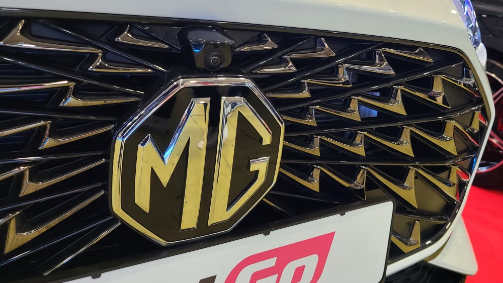 MG One логотип решетка