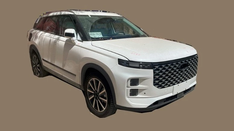 Новый гибридный кроссовер Chery Explore 06 сбоку спереди