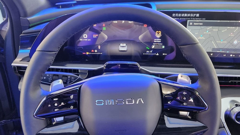 Кроссовер Omoda C9 для ЮАР Exeed RX салон интерьер