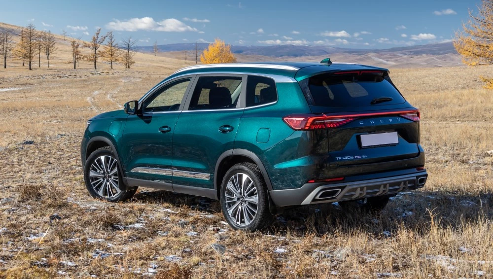 Chery Tiggo 8 Pro Plug-in Hybrid в статике сбоку сзади