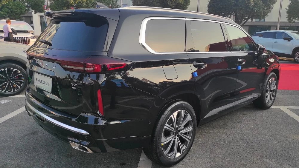 Exeed VX обновленный сбоку сзади новый