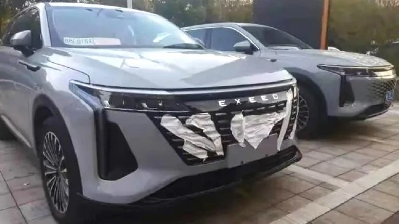 рестайлинг Exeed RX спереди сбоку решетка обновленный