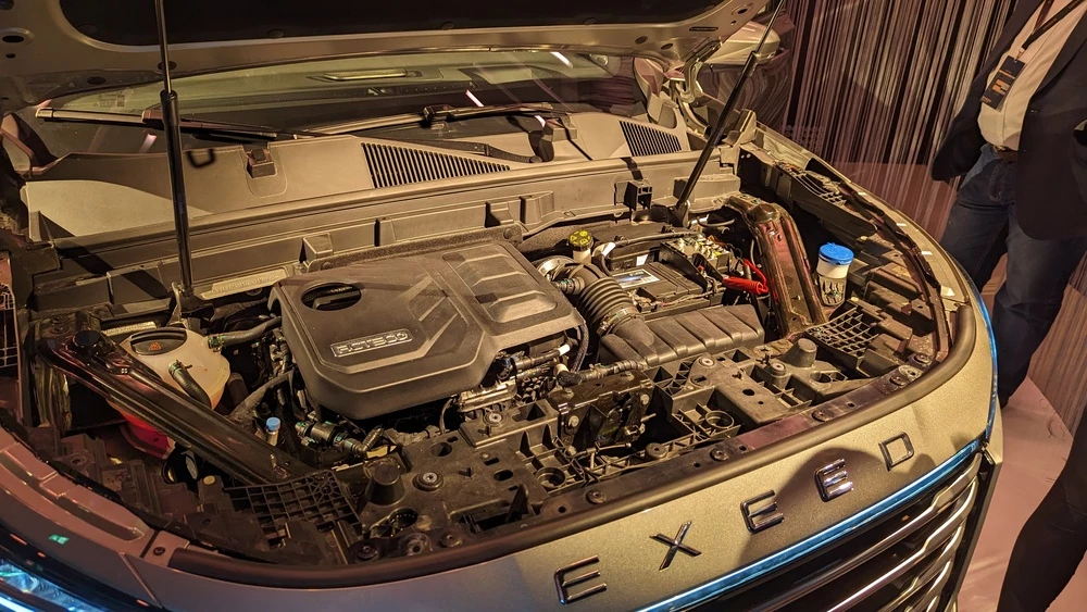 Обновленный Exeed VX нового поколения в России двигатель мотор капот