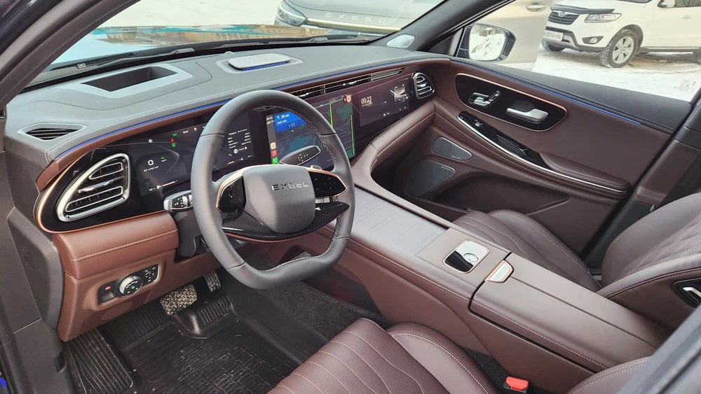 Exeed VX тест салон интерьер первый ряд