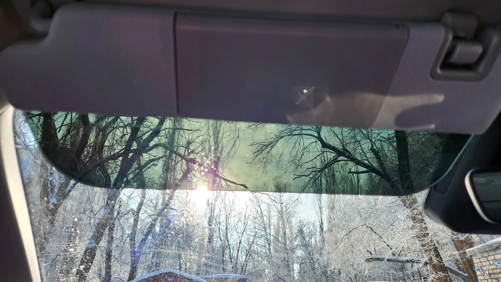 Кроссовер Geely Atlas салон интерьер козырьки прозрачная часть