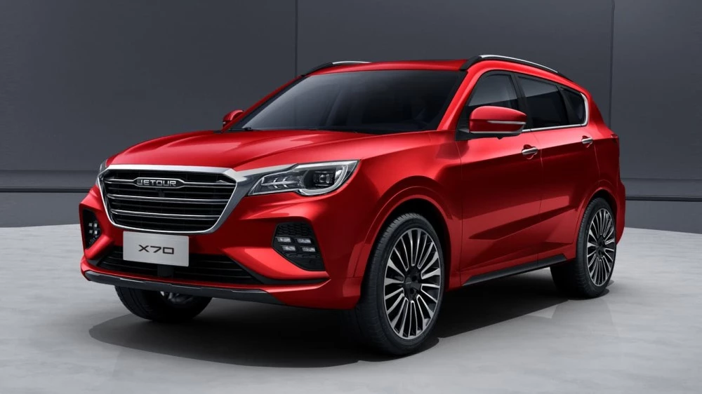 X70, но без Plus. Jetour привезет в Россию новый кроссовер Jetour X70 сбоку спереди