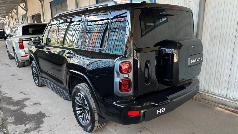 новый внедорожник haval h9 второе поколение черный сбоку сзади дилер россия москва