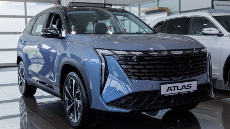 GEELY БИЗНЕС КАР Лосиный остров Atlas у дилера в автосалоне сбоку спереди