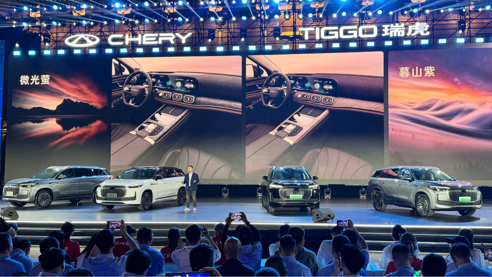 chery tiggo 9 обновленный 2025 модельного года сбоку спереди серый зеленый бензин гибрид