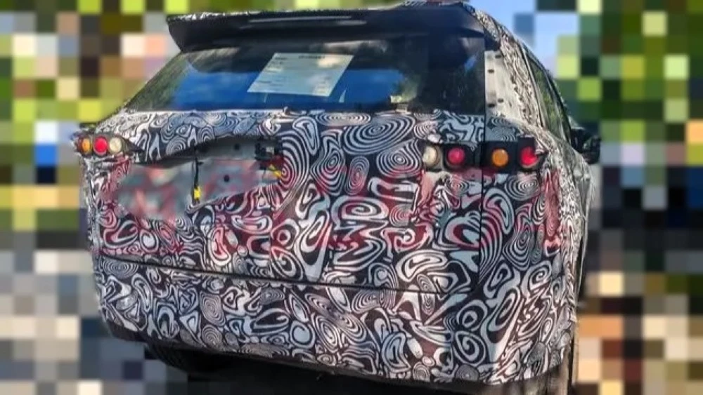 электрический кроссовер jaecoo j5 сзади в Китае