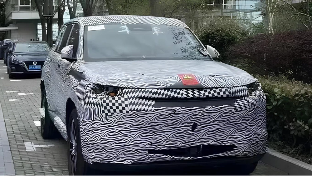gac s7шпионский снимок сбоку спереди камуфляж гибридный кроссовер