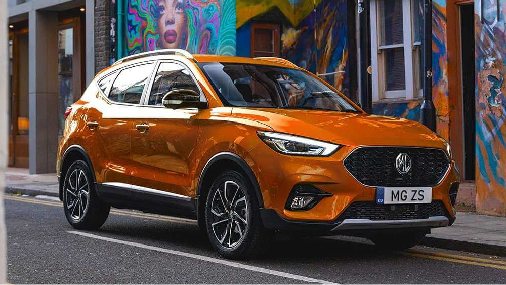 mg zs сбоку спереди коричневый кроссовер россия оттс