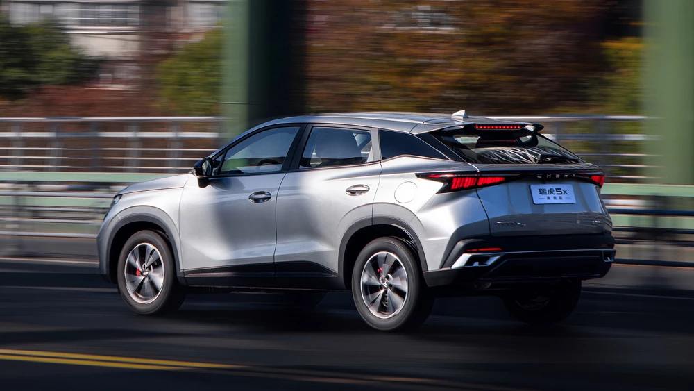 Chery Tiggo 5x High Energy Omoda C5 сбоку сзади