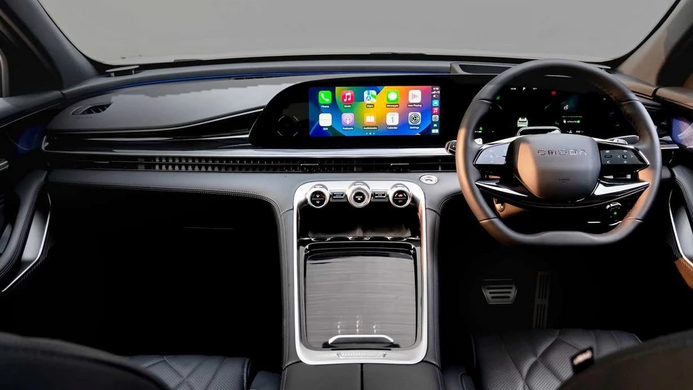 Omoda C9 на базе Exeed RX в Малайзии салон интерьер