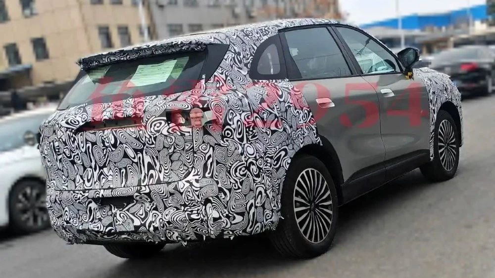 Chery T1G Tiggo 7L в Китае сбоку сзади