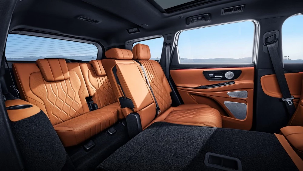 гибридный Exeed VX C-DM салон интерьер сиденья второй ряд