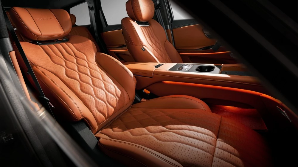 гибридный Exeed VX C-DM салон интерьер сиденья первый ряд