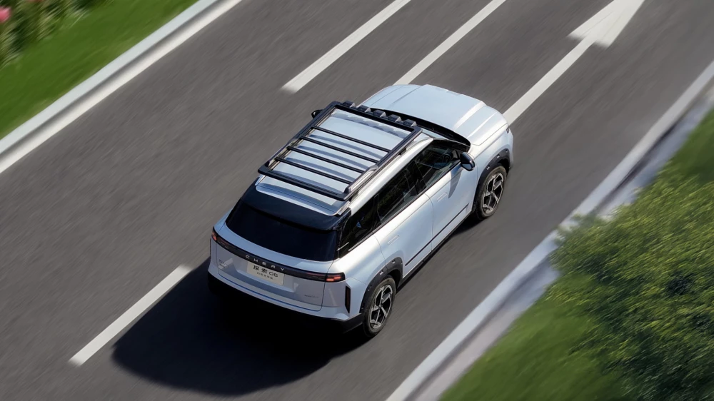 chery explore 06 awd discovery кроссовер сбоку сзади серебряный