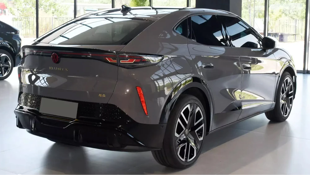 volkswagen id.unyx сбоку сзади кроссовер серый