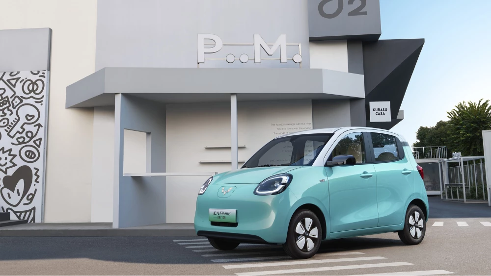 wuling hongguang mini ev сбоку спереди электрический ситикар голубой 