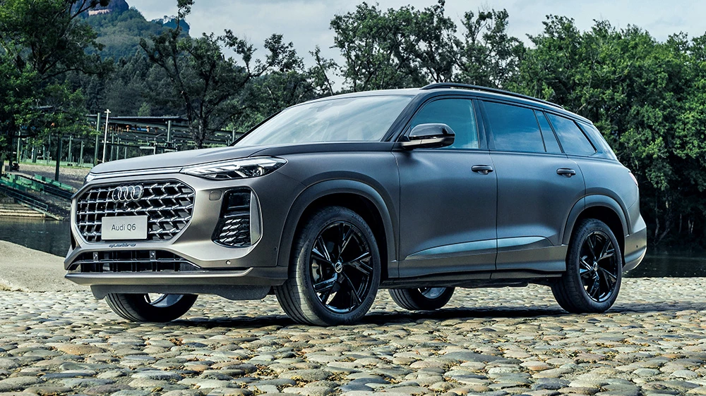 audi q6 сбоку спереди серый кроссовер самый качественный кроссовер китайской сборки по итогам 2025 года