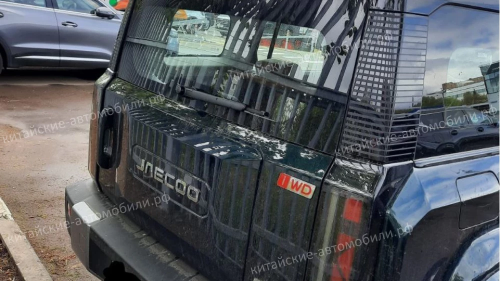 jaecoo ej6 кроссовер сбоку сзади iwd россия зеленый электромобиль