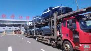 nordcross 001 на автовозе сбоку спереди на базе lynk & co 09