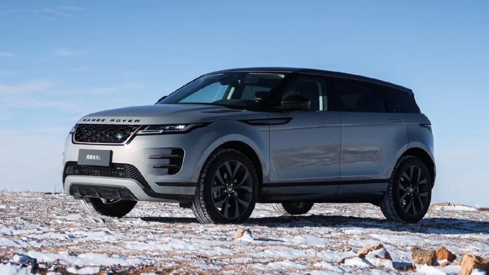 range rover evoque l сбоку спереди серый