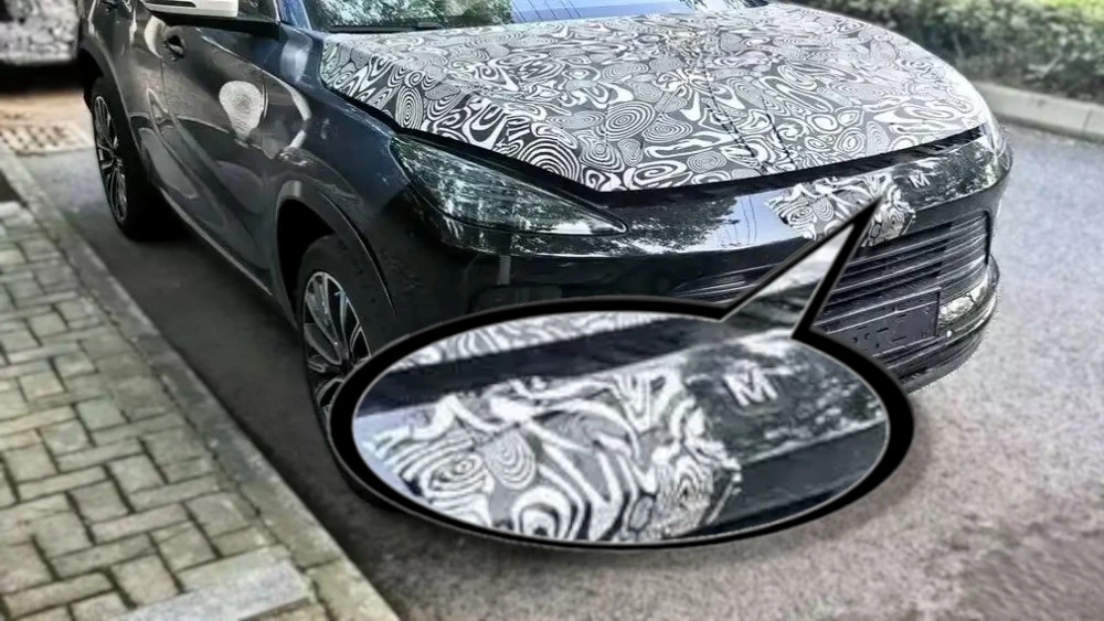 новый exeed txl кроссовер сбоку спереди