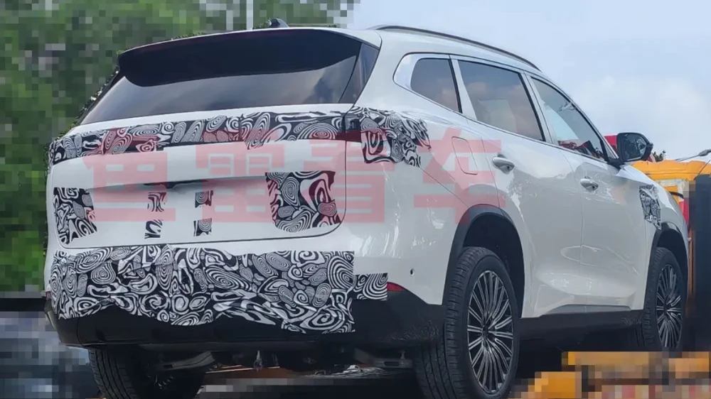 exeed txl e0s гибридный кроссовер сбоку сзади камуфляж