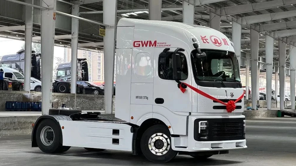 gwm грузовик первый гибридный hi4-g сбоку спереди белый