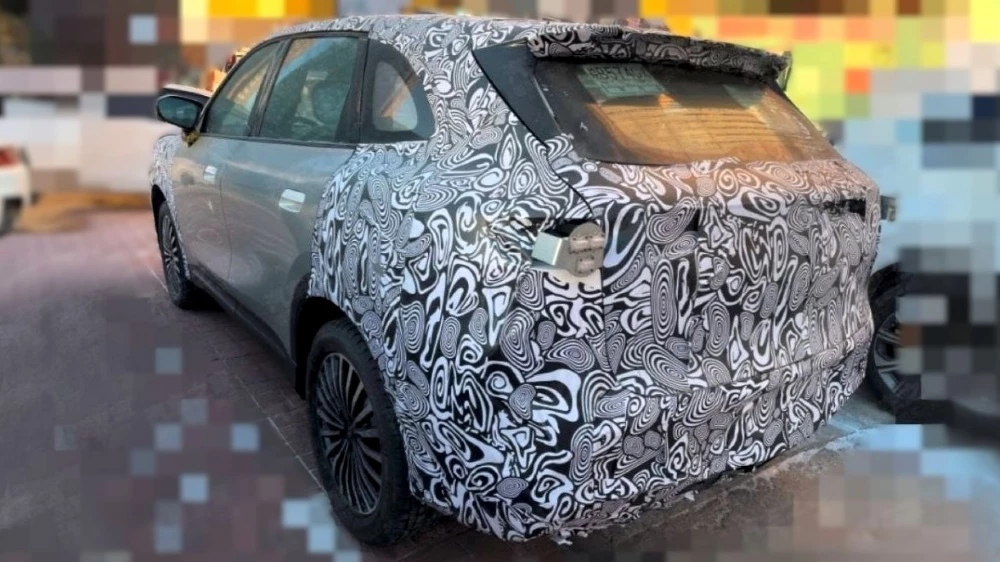 Chery T1G Tiggo 7L в Китае сзади сбоку