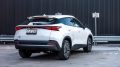 электрический кроссовер chery omoda E5 сбоку сзади