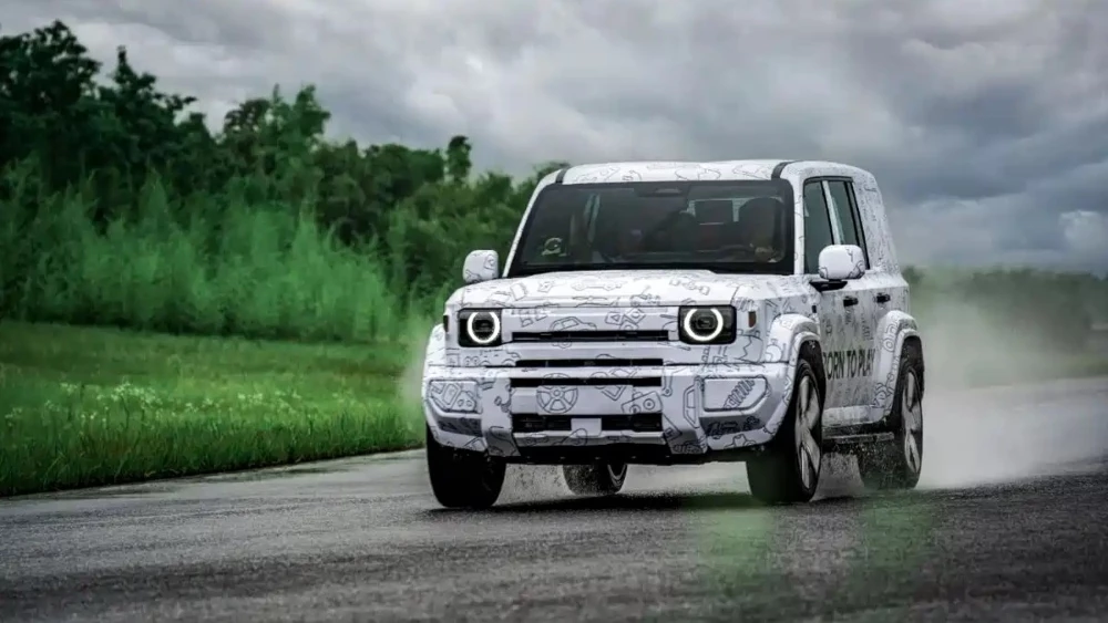 iCaur V27 icar chery фото камуфляж сбоку спереди в динамике