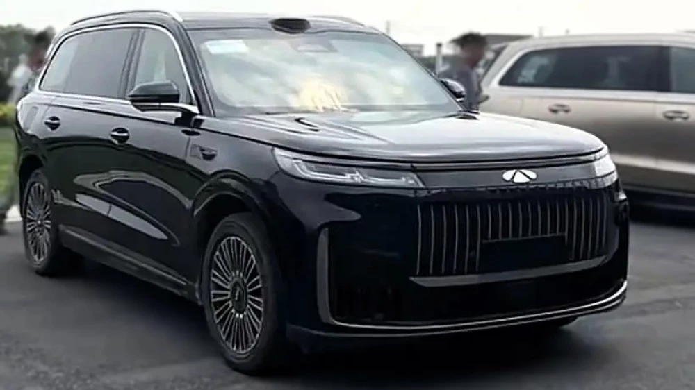 Chery Fulwin T11 кроссовер сбоку спереди гибридный