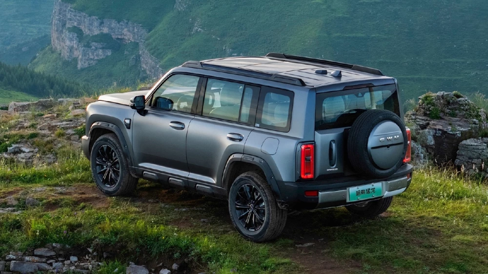 haval raptor hi4 обновленный 2026 модельного года гибридный кроссовер сбоку сзади бирюзовый