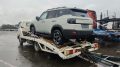 Jetour T1 на автовозе сбоку сзади в России