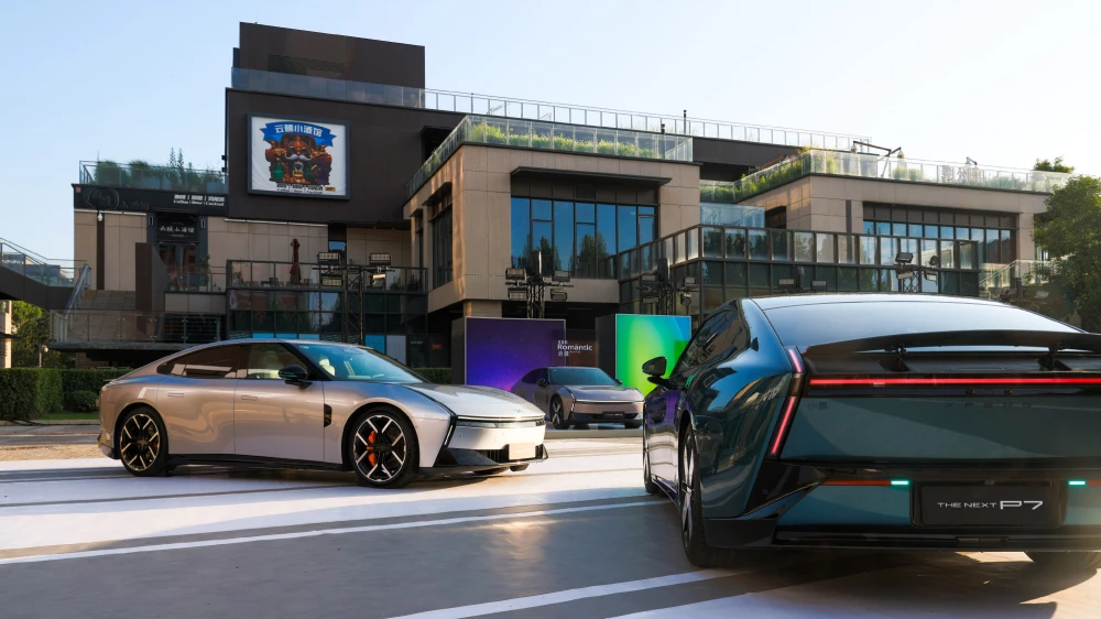 Китайская марка Xpeng может появиться в СНГ. Что нужно о ней знать xpeng p7 новый сбоку спереди сзади