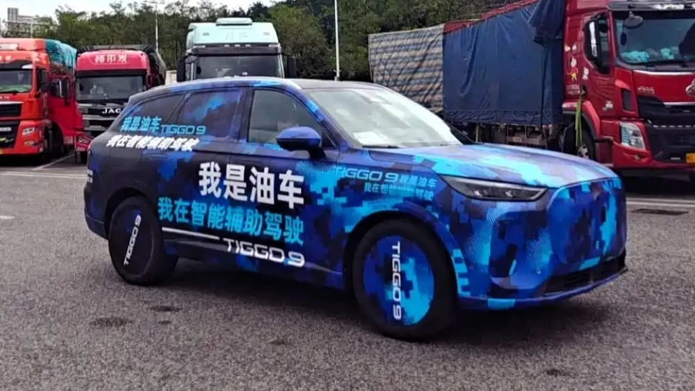 Chery Tiggo 9X спереди кроссовер в камуфляже